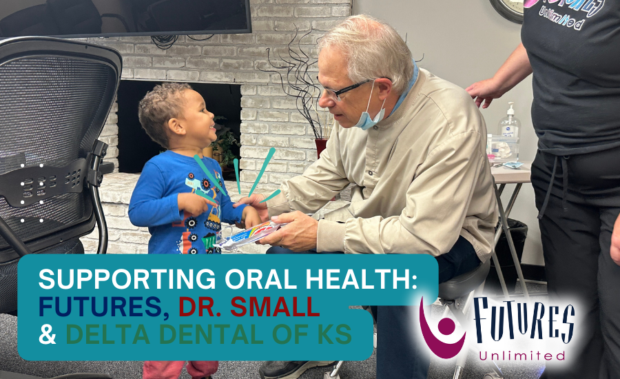 dentist handing child smile kit to promote dental oral health